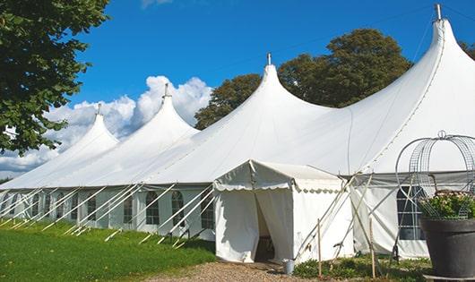 high-quality portable restrooms stationed at a wedding, meeting the needs of guests throughout the outdoor reception in Jefferson WV